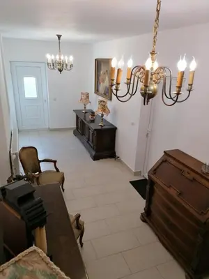 Ein Sitzbereich in der Unterkunft Ferienwohnung 1 Landhaus Thätner