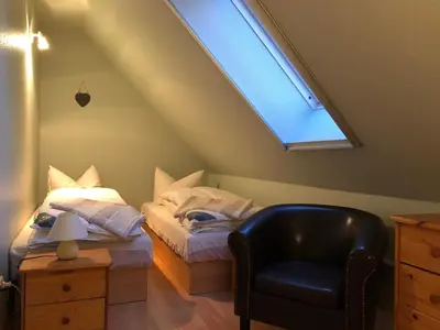 Ein Bett oder Betten in einem Zimmer der Unterkunft Ferienhaus mit Sauna a & b