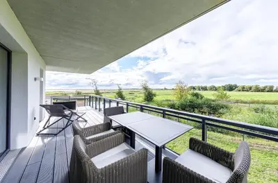 Ein Balkon oder eine Terrasse in der Unterkunft Strandnixe 5 Sterne Ferienwohnung mit Eckbalkon und traumhaften Blick