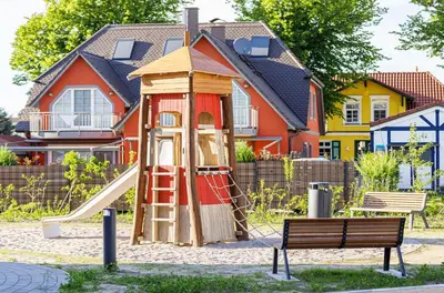 Ein Kinderspielbereich in der Unterkunft Strandlounge - 5 Sterne-Wohnung mit XXL-Balkon, Wellness & Boddenblick