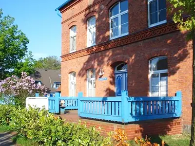Ein Garten an der Unterkunft Kapitänshaus Mühlenpark Haus 6 Wo 21