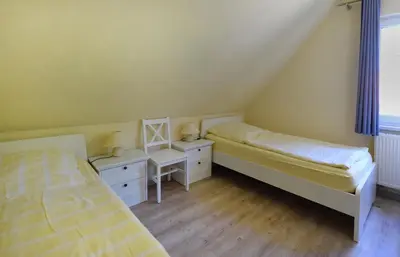 Ein Bett oder Betten in einem Zimmer der Unterkunft Ankerplatz RH 4