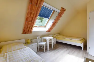 Ein Bett oder Betten in einem Zimmer der Unterkunft Ankerplatz RH 2