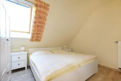 Ein Bett oder Betten in einem Zimmer der Unterkunft Ankerplatz RH 2