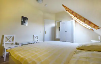 Ein Bett oder Betten in einem Zimmer der Unterkunft Ankerplatz RH 6