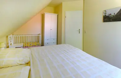 Ein Bett oder Betten in einem Zimmer der Unterkunft Ankerplatz RH 5