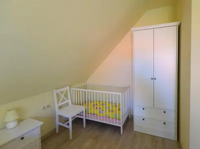 Ein Bett oder Betten in einem Zimmer der Unterkunft Ankerplatz RH 5