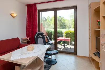 Ein Sitzbereich in der Unterkunft Haus Ahrens Wohnung 3