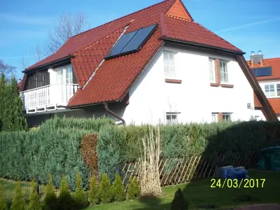 Ein Garten an der Unterkunft Hägerende 66 Haus Windrose Wohnung Südwind