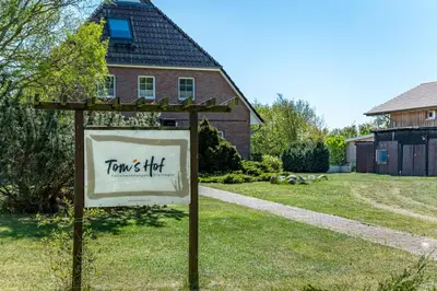 Ein Garten an der Unterkunft Tom's Hof Ferienwhg Inga