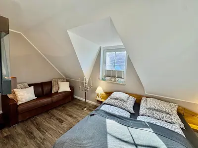 Ein Bett oder Betten in einem Zimmer der Unterkunft Haus Ostseewelle