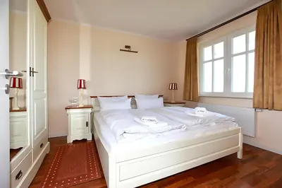 Ein Bett oder Betten in einem Zimmer der Unterkunft Apartment Saatmann Komfort 6