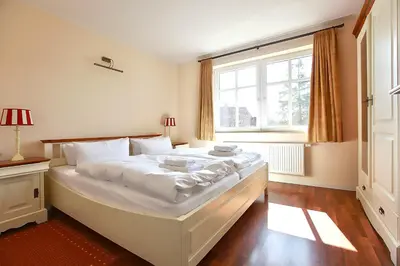 Ein Bett oder Betten in einem Zimmer der Unterkunft Apartment Saatmann Komfort 10