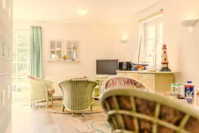 TV/Unterhaltungsangebot in der Unterkunft Achtern Diek Haus 12a Wohnung 3
