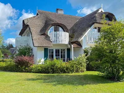 Ein Garten an der Unterkunft Santa Karina - Maisonette mit Südwestbalkon