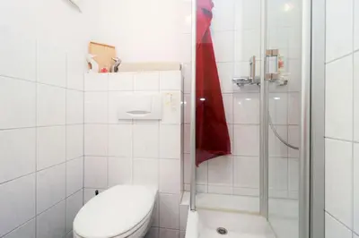 Ein Badezimmer in der Unterkunft Deutsches Haus Zimmer 33