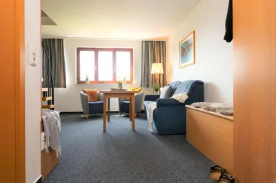 Ein Sitzbereich in der Unterkunft Deutsches Haus Zimmer 36