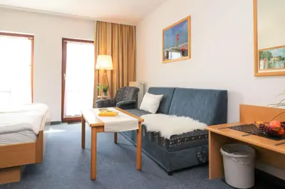 Ein Sitzbereich in der Unterkunft Deutsches Haus Zimmer 28