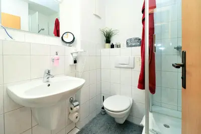 Ein Badezimmer in der Unterkunft Deutsches Haus Zimmer 21