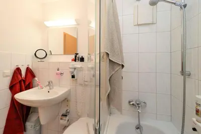 Ein Badezimmer in der Unterkunft Deutsches Haus Zimmer 39