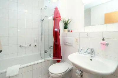 Ein Badezimmer in der Unterkunft Deutsches Haus Zimmer 16
