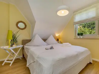 Ein Bett oder Betten in einem Zimmer der Unterkunft Holiday apartment with 1 bedroom