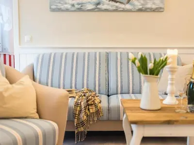 Ein Sitzbereich in der Unterkunft Villa Strandblick 5