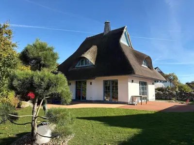 Ein Garten an der Unterkunft Ferienhaus Haubenlerche, Fuhlendorf