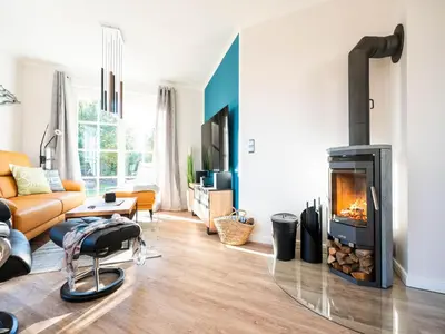 Ein Sitzbereich in der Unterkunft Ferienhaus Haubenlerche, Fuhlendorf