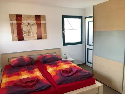 Ein Bett oder Betten in einem Zimmer der Unterkunft Ferienhaus Becker