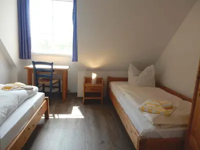 Ein Bett oder Betten in einem Zimmer der Unterkunft Resi A6