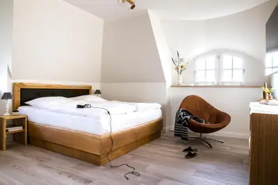 Ein Bett oder Betten in einem Zimmer der Unterkunft Ferienhaus Seeadler 9