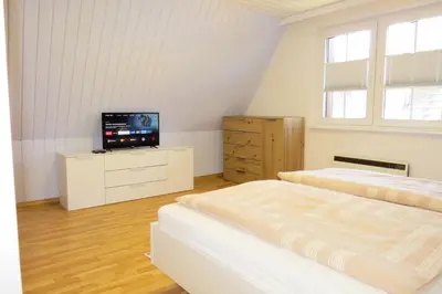 Ein Bett oder Betten in einem Zimmer der Unterkunft Prerower Seekiste