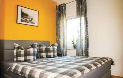 Ein Bett oder Betten in einem Zimmer der Unterkunft 1 Bedroom Nice Home In Fuhlendorf