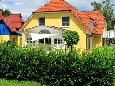 Ein Garten an der Unterkunft Wiesenstraße 55 Whg 1 - Meeresbrise
