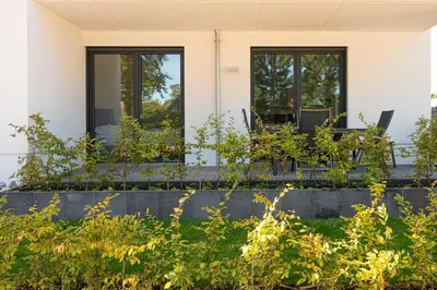 Ein Garten an der Unterkunft Apartmenthaus Wittsande - 01