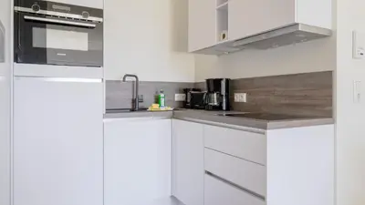 Küche/Küchenzeile in der Unterkunft Apartmenthaus Wittsande Wittsande 07