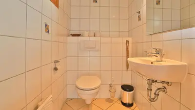 Ein Badezimmer in der Unterkunft Heideröschen Park Heideröschen 7a