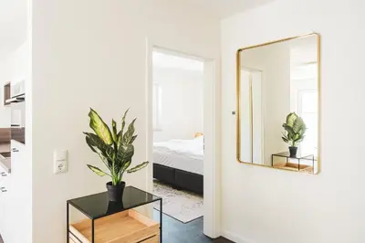 Ein Bett oder Betten in einem Zimmer der Unterkunft Dünenquartier Apartment 19
