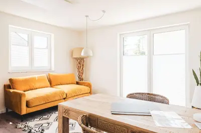 Ein Sitzbereich in der Unterkunft Dünenquartier Apartment 28