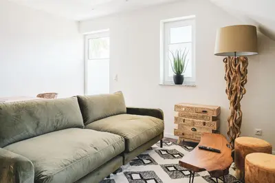 Ein Sitzbereich in der Unterkunft Dünenquartier Apartment 30