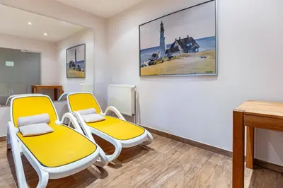 Ein Sitzbereich in der Unterkunft Strandhaus Claassen 02
