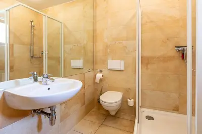 Ein Badezimmer in der Unterkunft Strandhaus Claassen 02