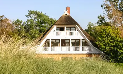 Ein Garten an der Unterkunft Strandhaus Claassen 08