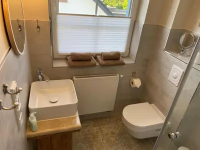 Ein Badezimmer in der Unterkunft Strandhaus Luma