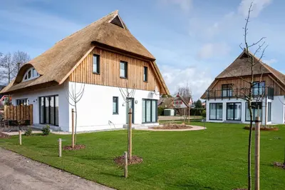 Ein Garten an der Unterkunft Reethus Reethus 4