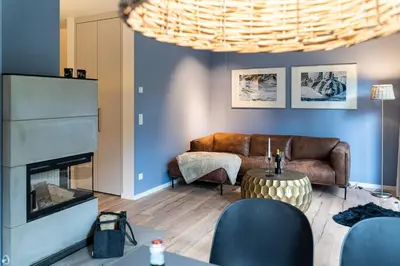 Ein Sitzbereich in der Unterkunft Haus Sandnelke - Domizil am Ostseewald