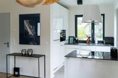 Küche/Küchenzeile in der Unterkunft Hagebutte-Sauna, Kamin & Terrasse
