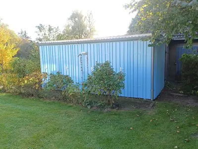 Ein Garten an der Unterkunft An den Boddenwiesen II