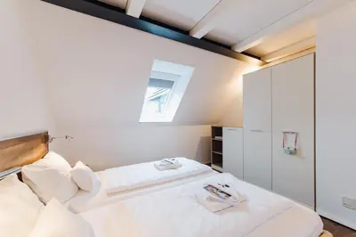 Ein Bett oder Betten in einem Zimmer der Unterkunft M2 Living Maisonette Apartment No 3